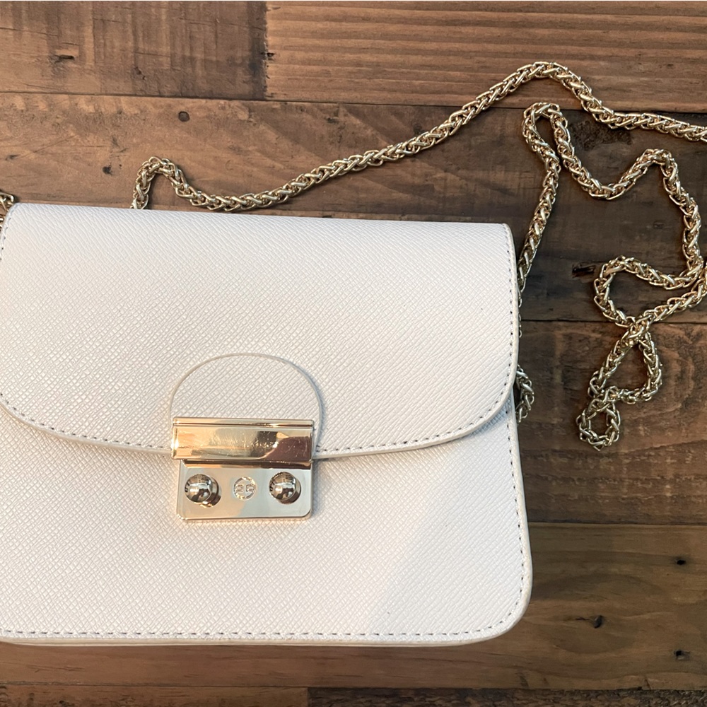 Ivory pebbled leather crossbody bag on long gold chain shoulder  strap
